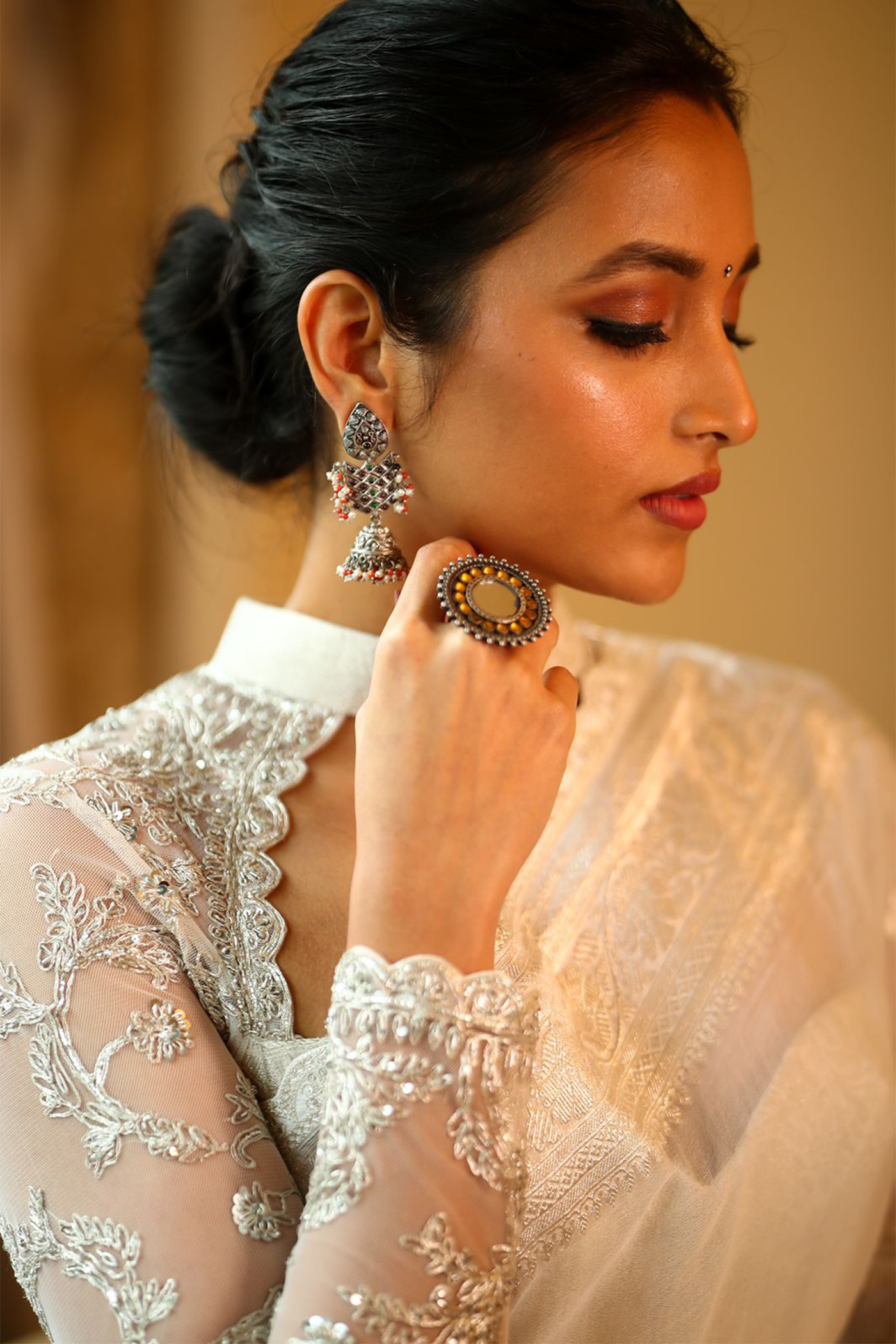 Srinidhi Shetty in White banaras saree paired with embroidered blouse