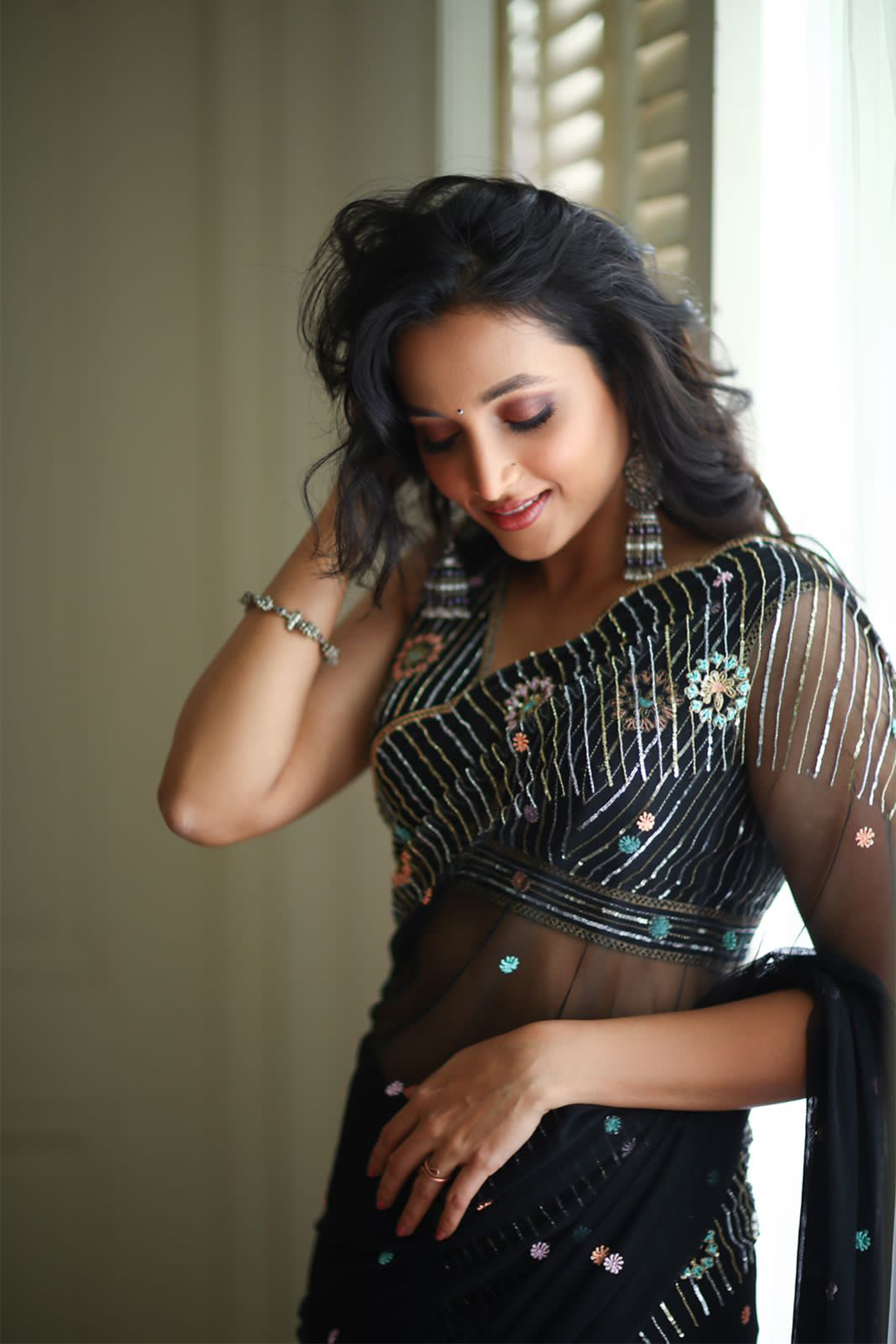 Srinidhi Shetty in Black embroidered saree with sleeveless blouse