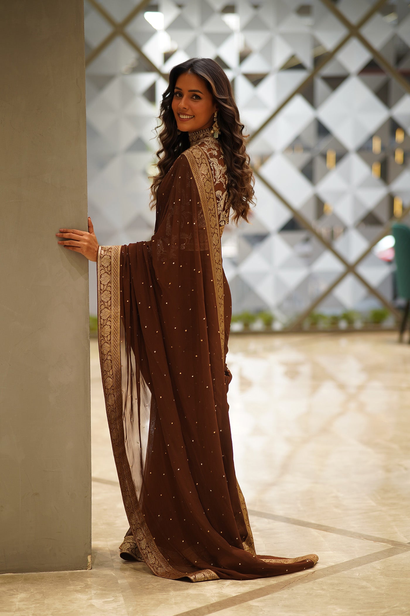 Sadhna in Brown zari embroidered saree & Blouse set