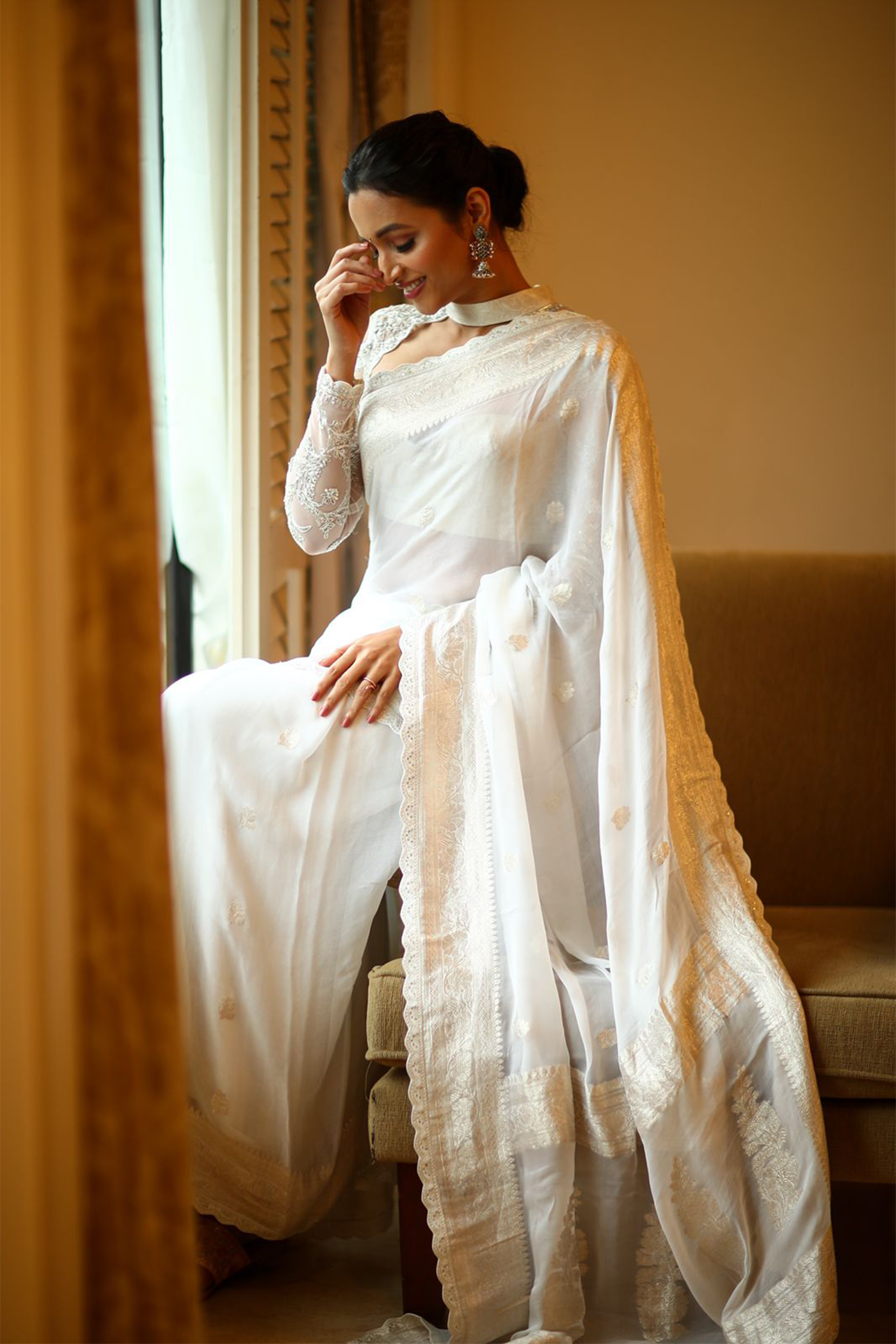 Srinidhi Shetty in White banaras saree paired with embroidered blouse