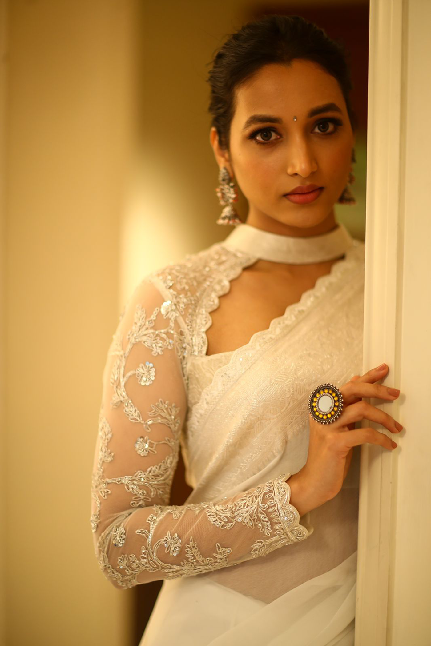 Srinidhi Shetty in White banaras saree paired with embroidered blouse