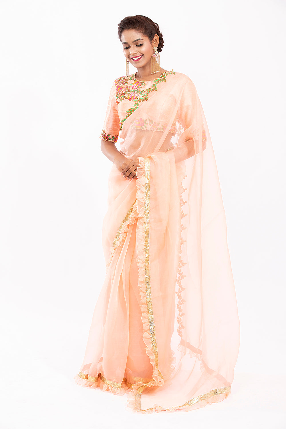 Peach ruffle embroidered saree