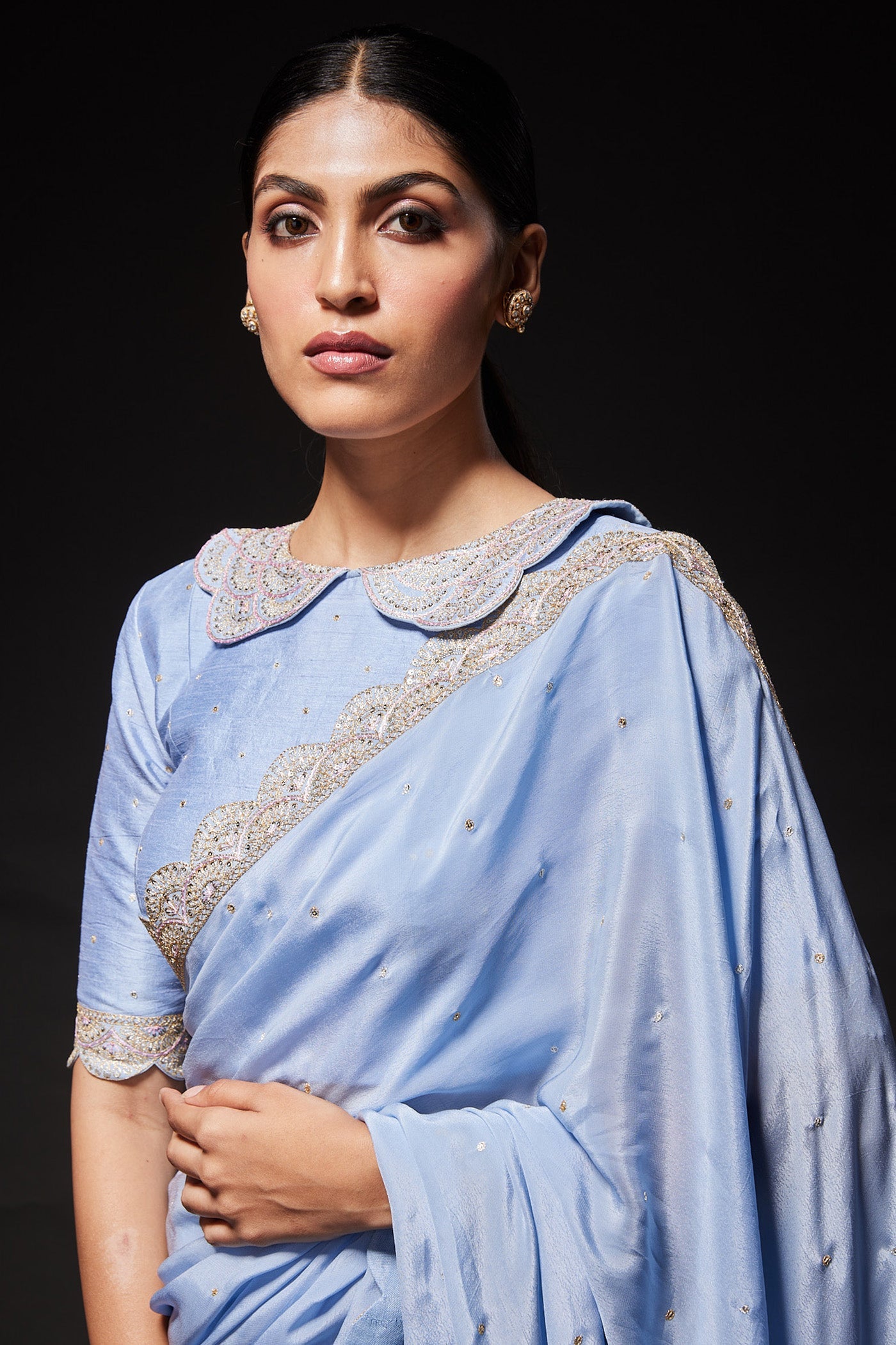 Powder blue scallop embroidered saree with peterpan collared blouse