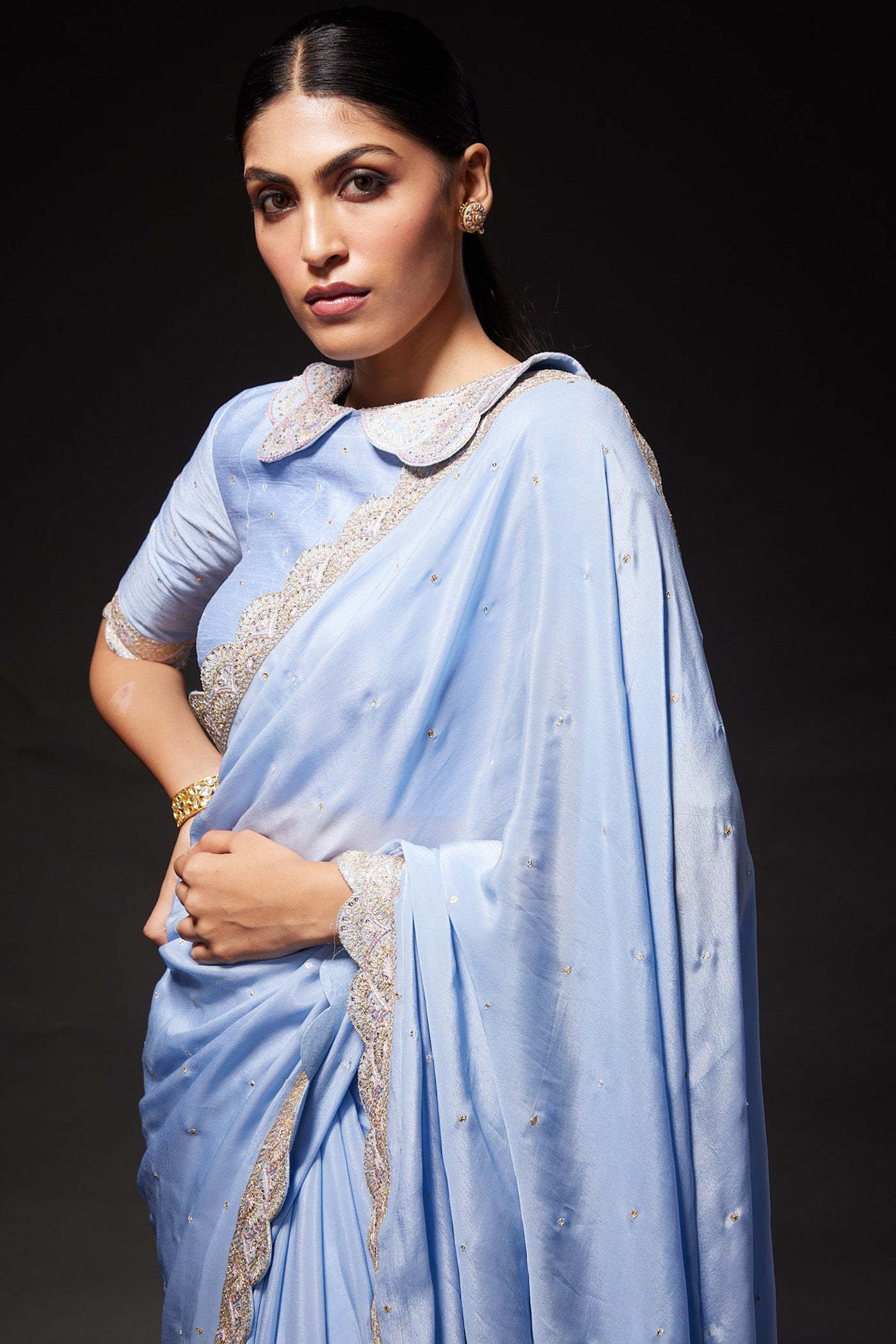 Powder blue scallop embroidered saree with peterpan collared blouse