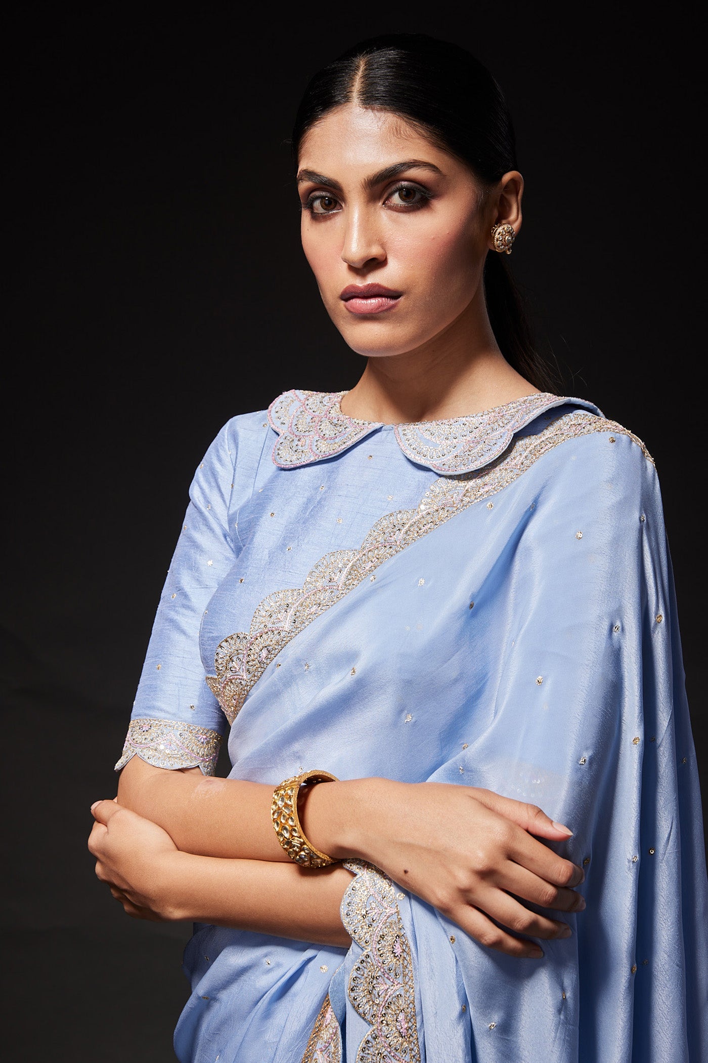 Powder blue scallop embroidered saree with peterpan collared blouse
