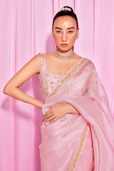 Rose gold embroidered saree with sleeveless blouse
