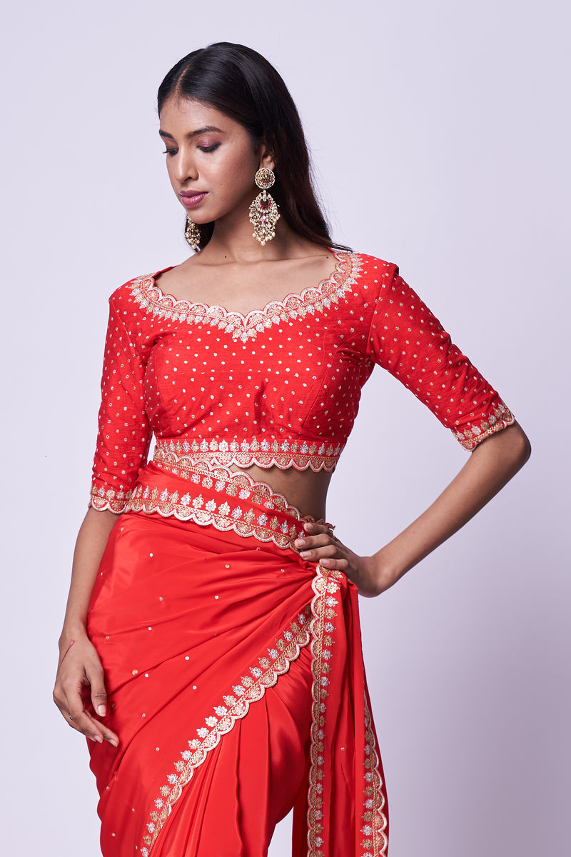 Red embroidered saree & Blouse set