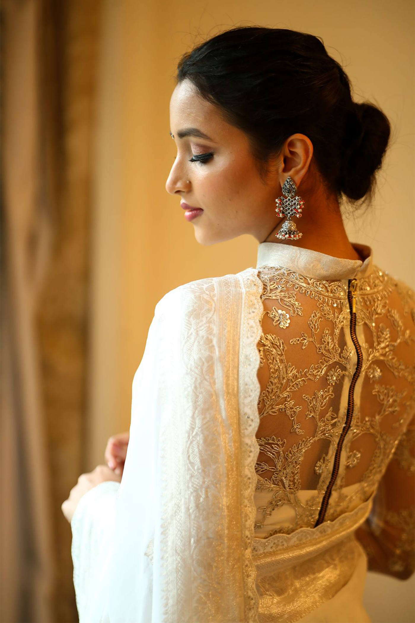 Srinidhi Shetty in White banaras saree paired with embroidered blouse