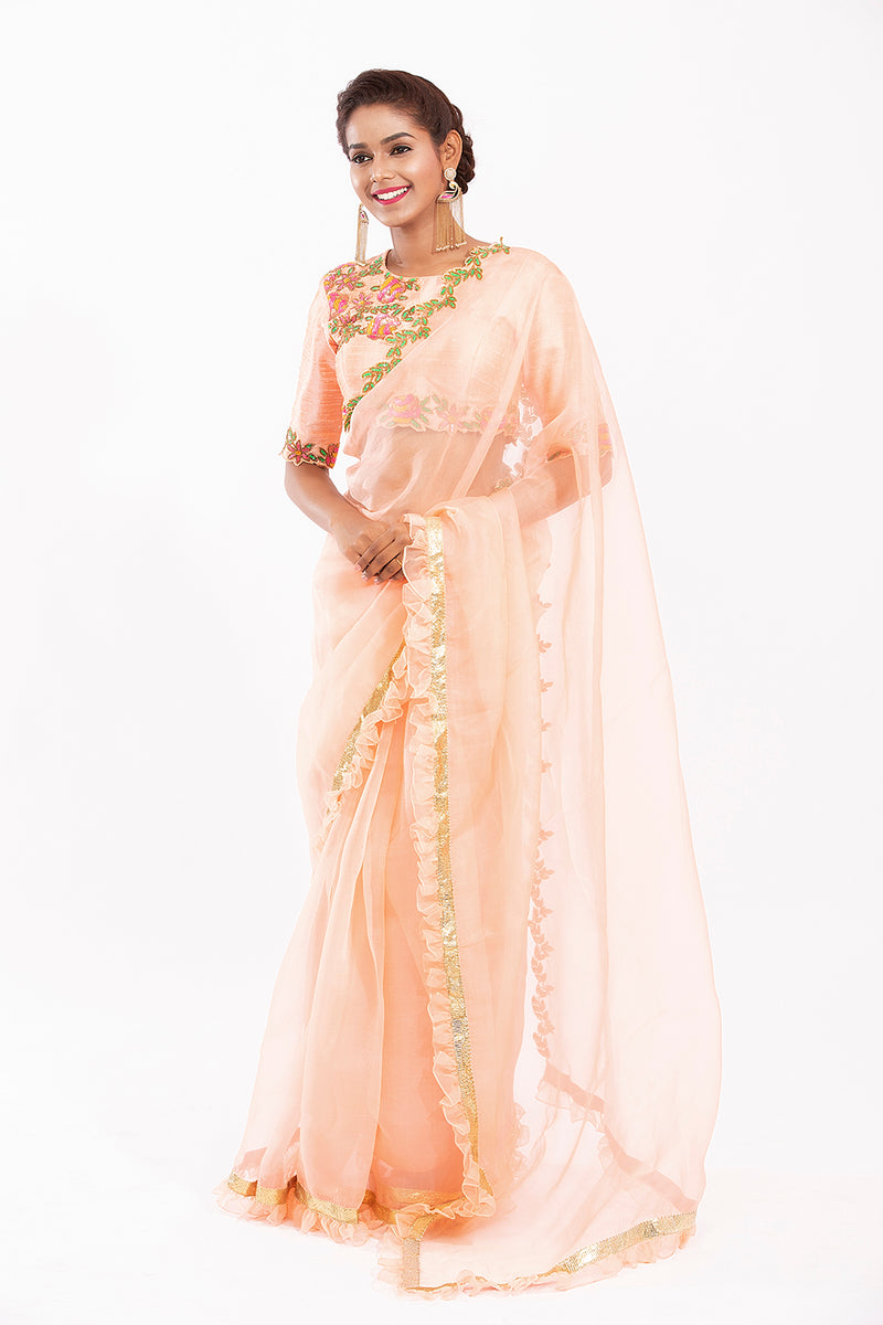 Peach ruffle embroidered saree